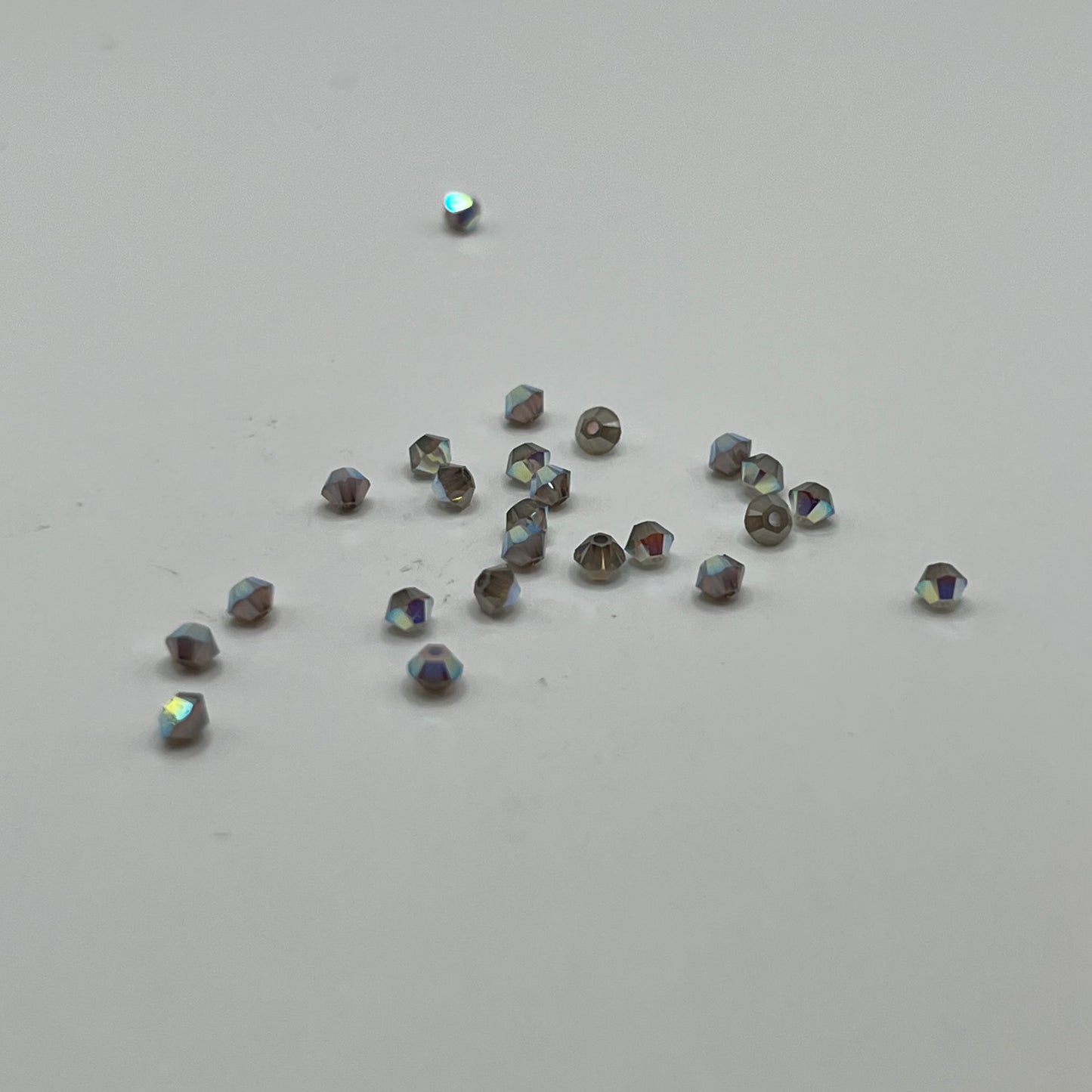 Swarovski 3MM Bicones - White Opal AB Satin (24pcs)