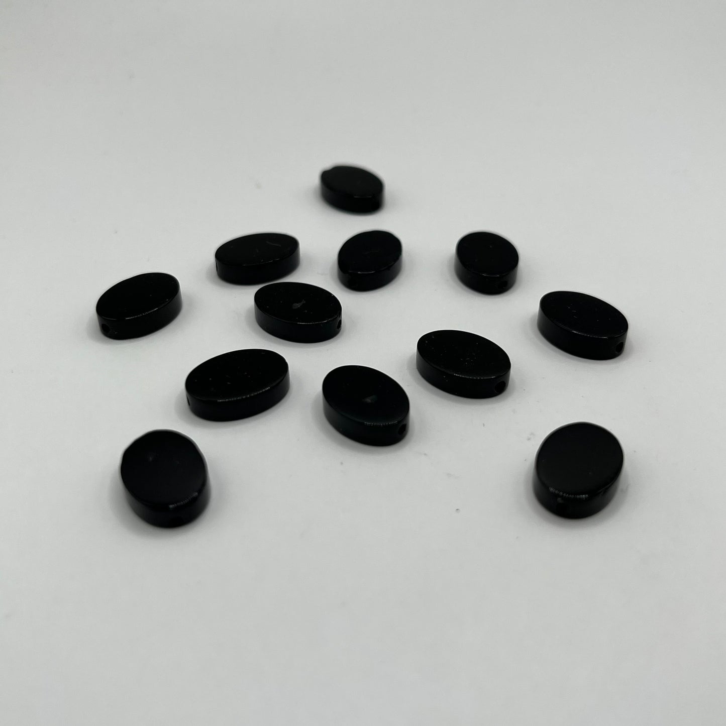 Onyx 14MM Oval Coin Strand (14pcs)