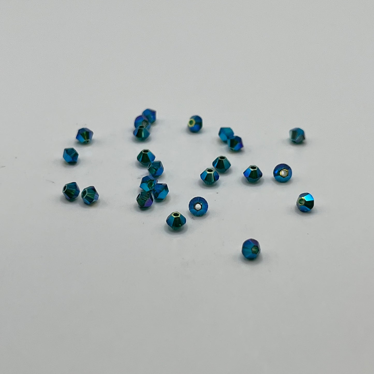 Swarovski 3MM Bicones - Emerald AB2X (24pcs)