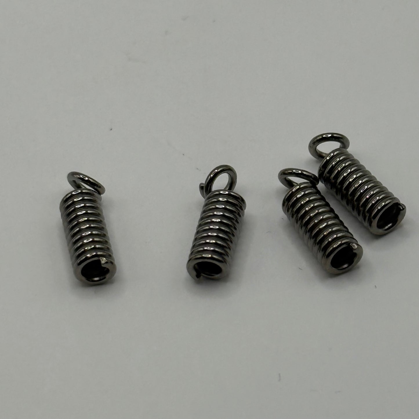 Coil Crimp - Gun Metal 10x4mm (4pcs)