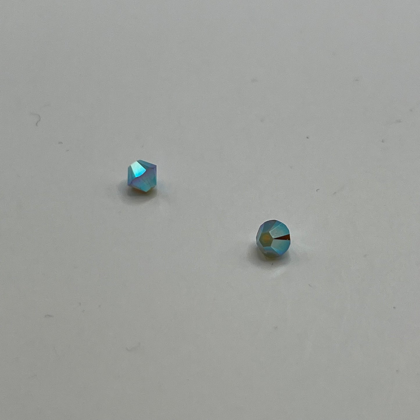 Swarovski 4MM Bicones - Pacific Opal AB2X (12pcs)