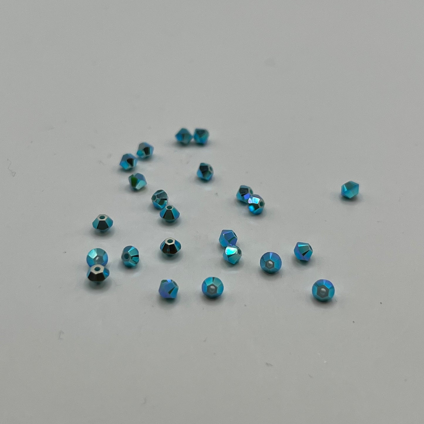 Swarovski 3MM Bicones - Turquoise AB2X (24pcs)