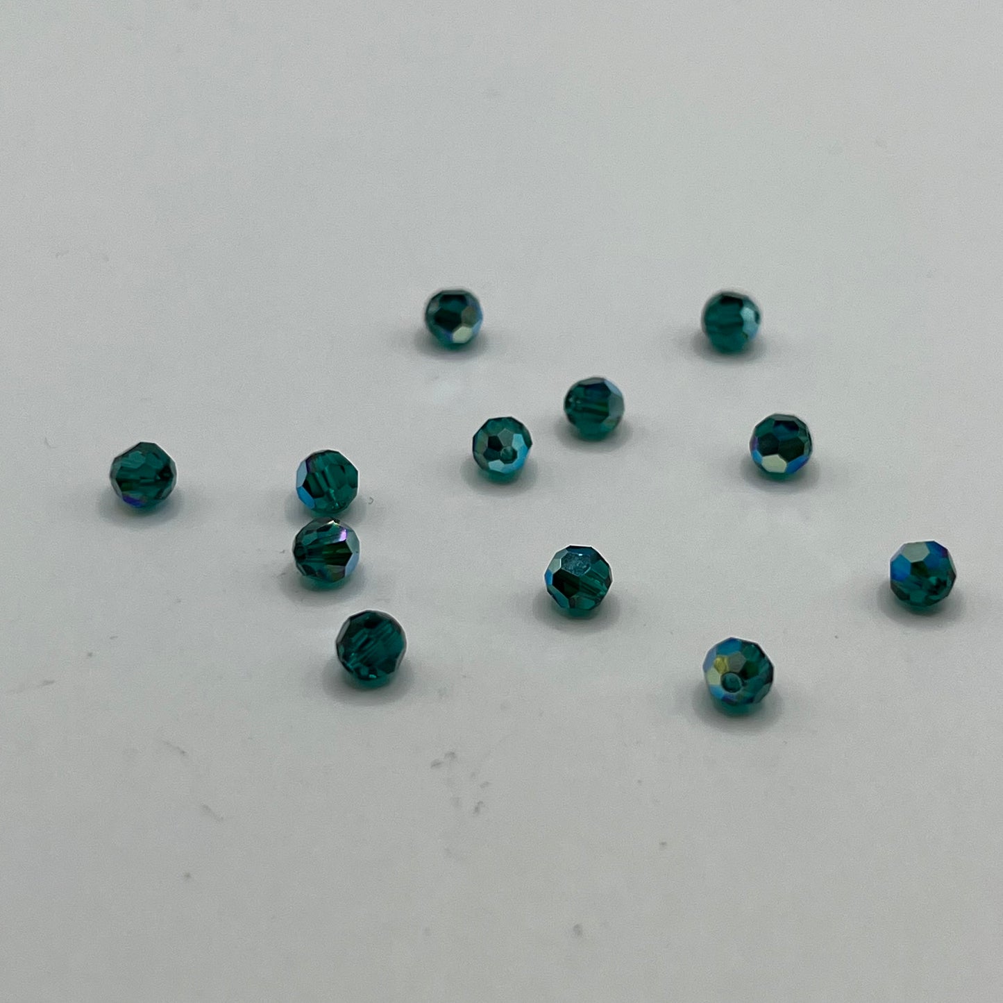 Swarovski 4MM Round Faceted A5000 - Emerald AB (12pcs)