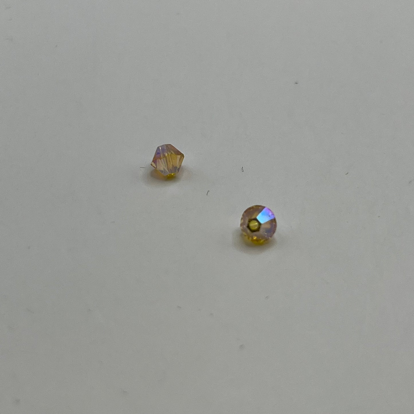 Swarovski 4MM Bicones - Light Topaz AB2X (12pcs)