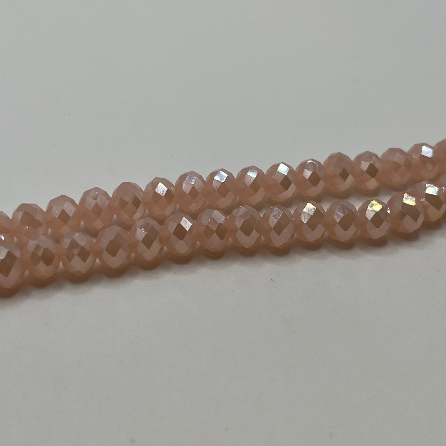 Chinese Crystal 8x6MM Faceted Rondelle Strand - Rose Peach AB