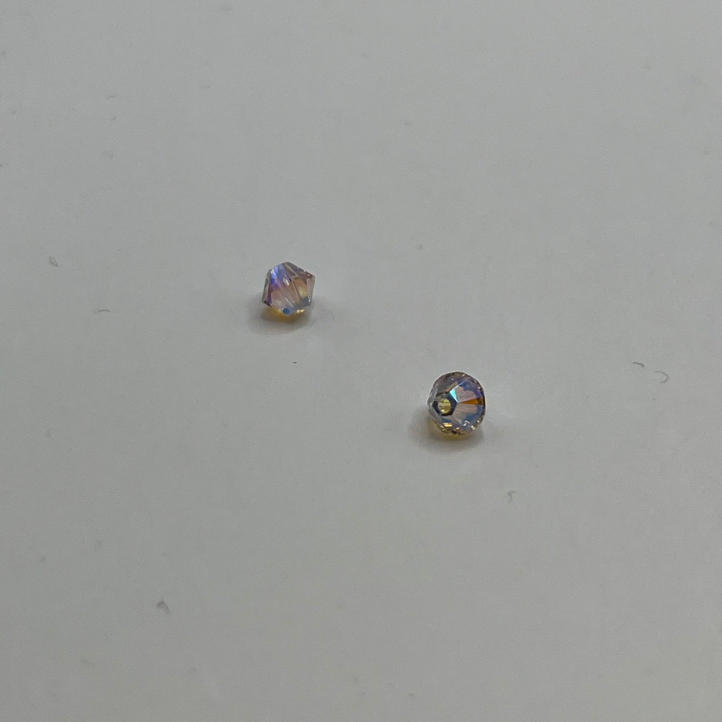 Swarovski 4MM Bicones - Ceylon Topaz AB2X (12pcs)