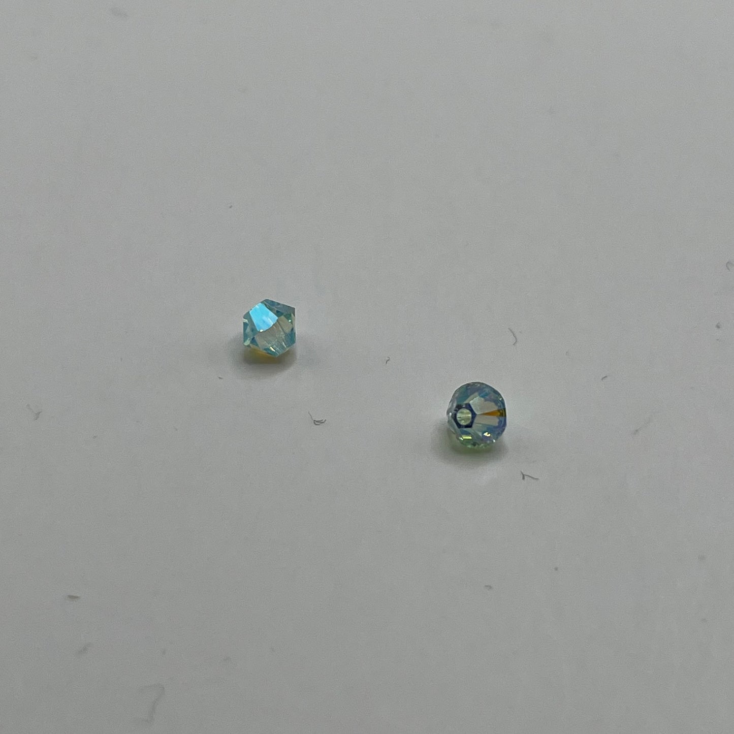 Swarovski 4MM Bicones - Chrysolite AB2X (12pcs)