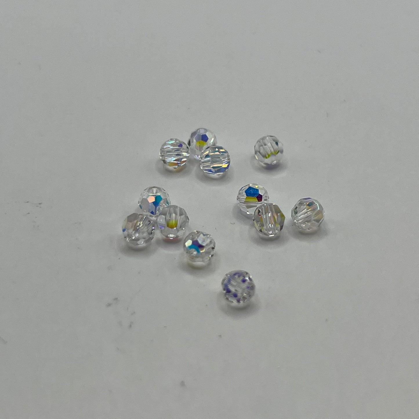 Swarovski 4MM Round Faceted A5000 - Crystal AB (12pcs)