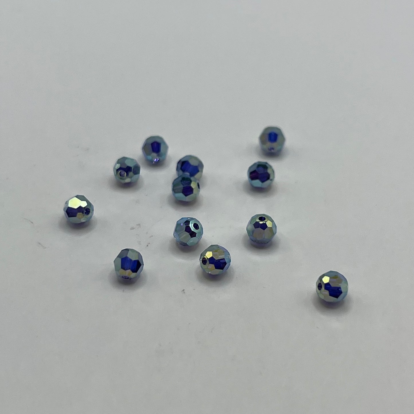 Swarovski 4MM Round Faceted A5000 - Tanzanite AB Full Coat (12pcs)