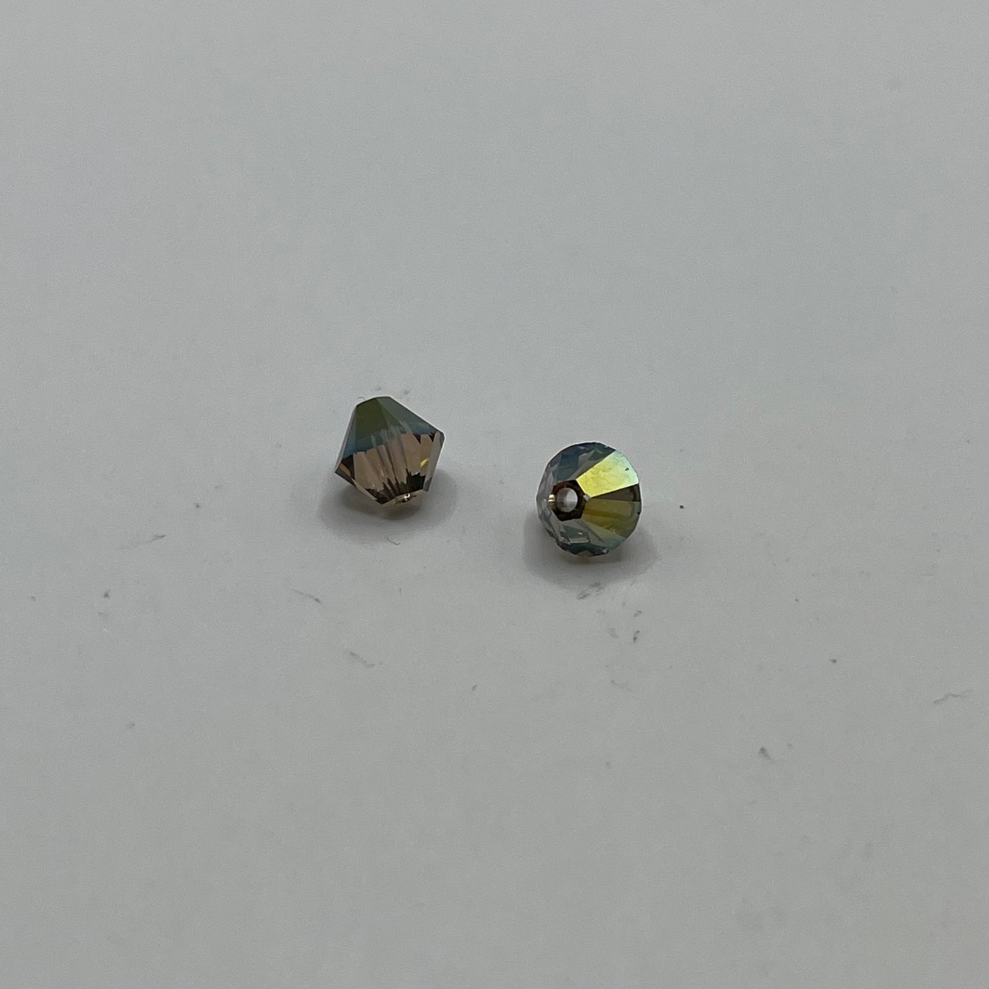 Swarovski 6MM Bicones - Crystal Iridescent Green (12pcs)
