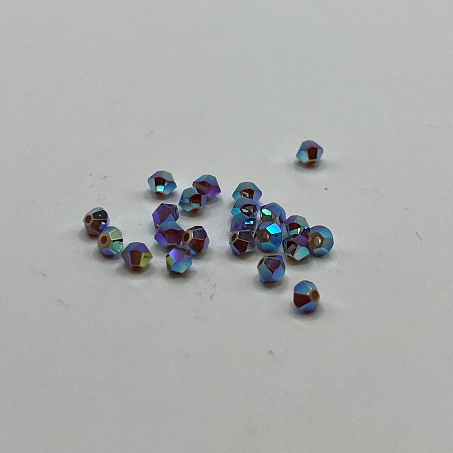 Swarovski 3MM Bicones - Opal Cyclamen AB2X (24pcs)