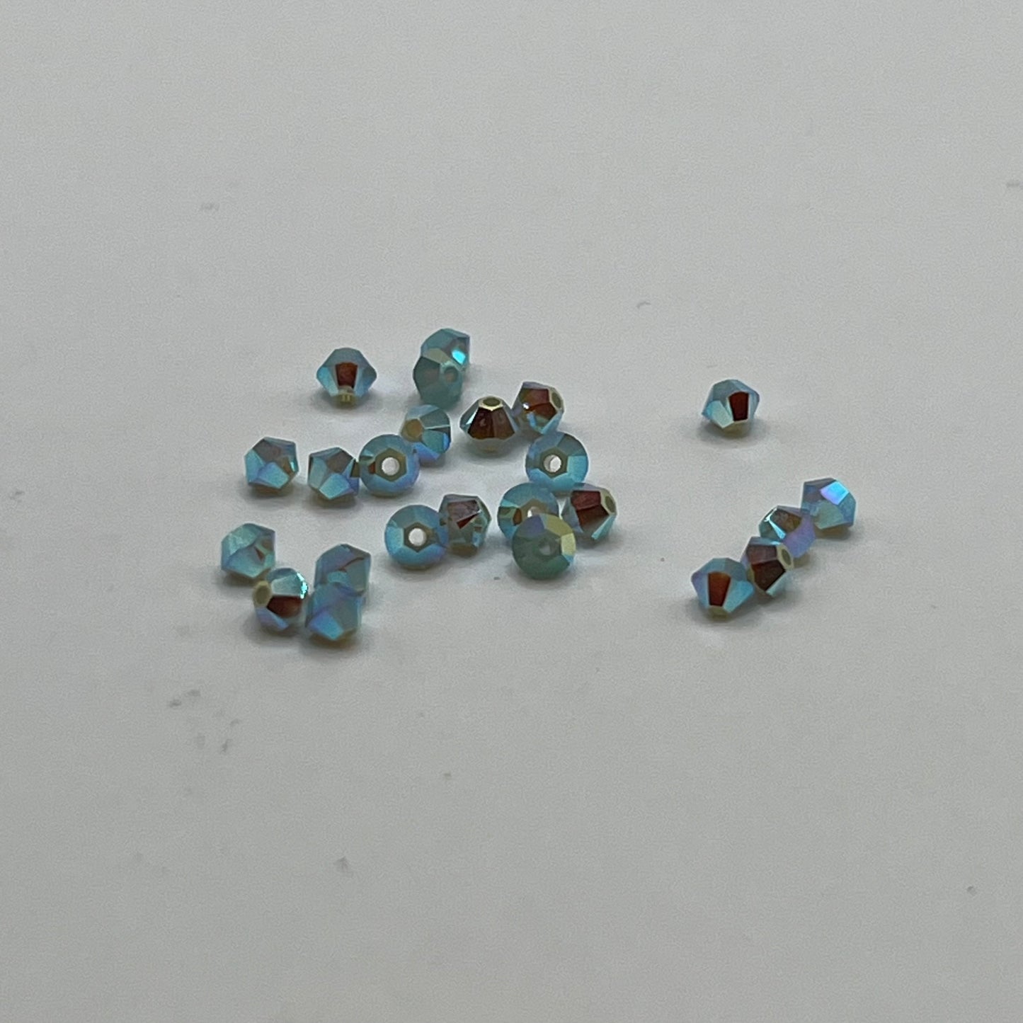 Swarovski 3MM Bicones - Pacific Opal AB2X (24pcs)