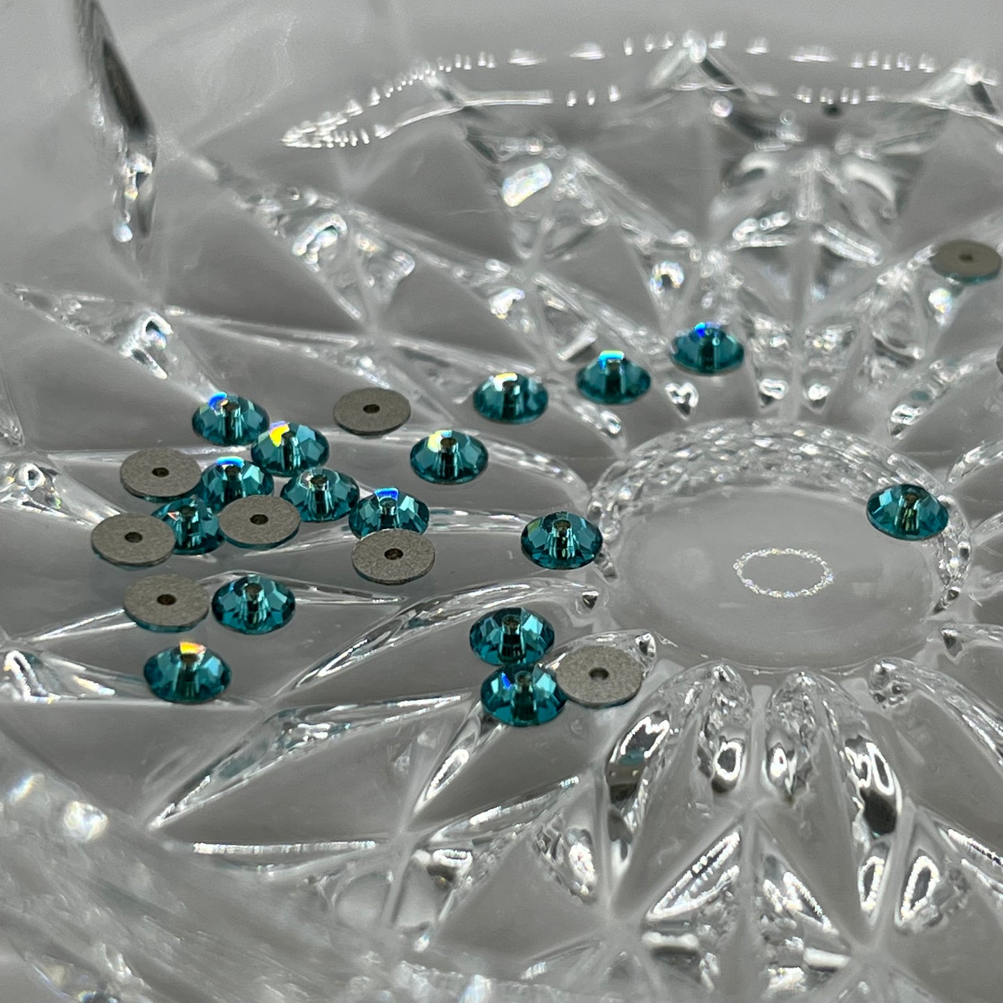 Swarovski 4MM Lochrosen A3128 - Light Turquoise (24pcs)