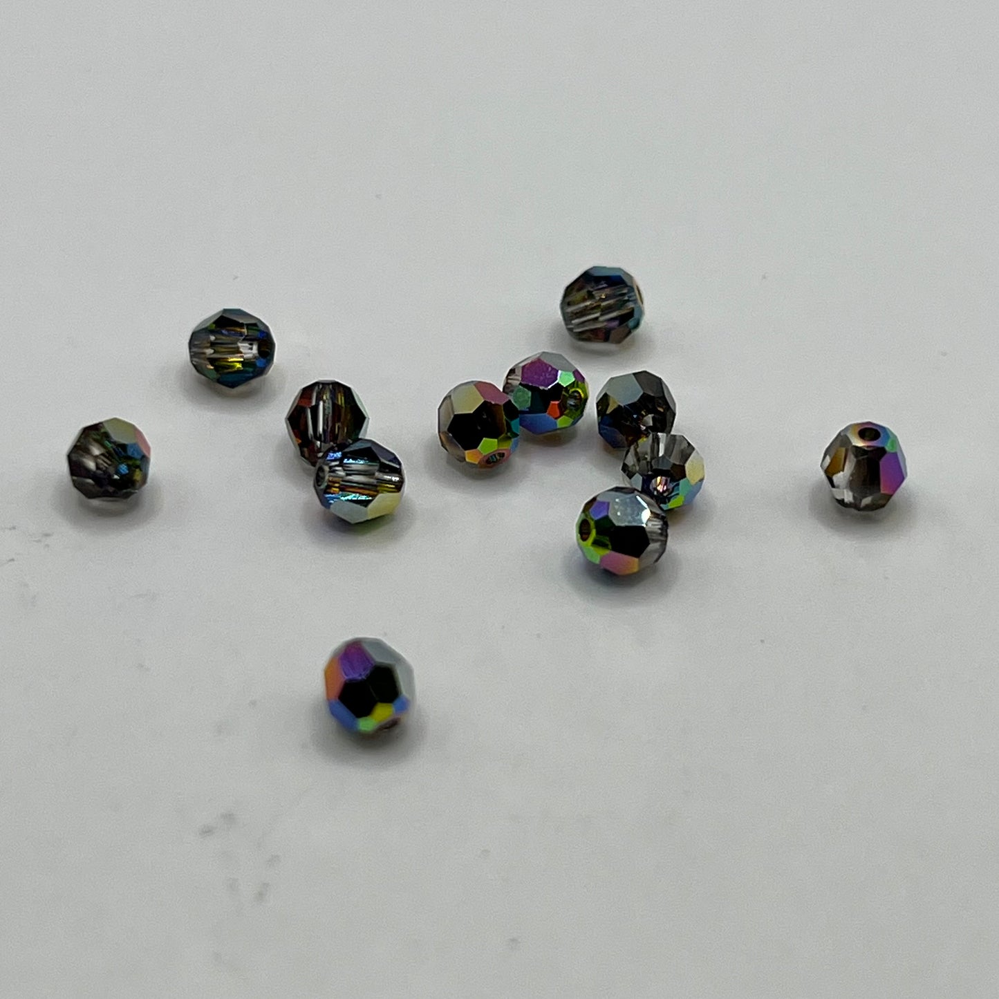Swarovski 4MM Round Faceted A5000 - Crystal Medium Vitrail (12pcs)