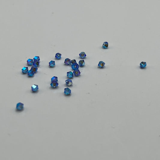 Swarovski 3MM Bicones - Sapphire AB2X (24pcs)