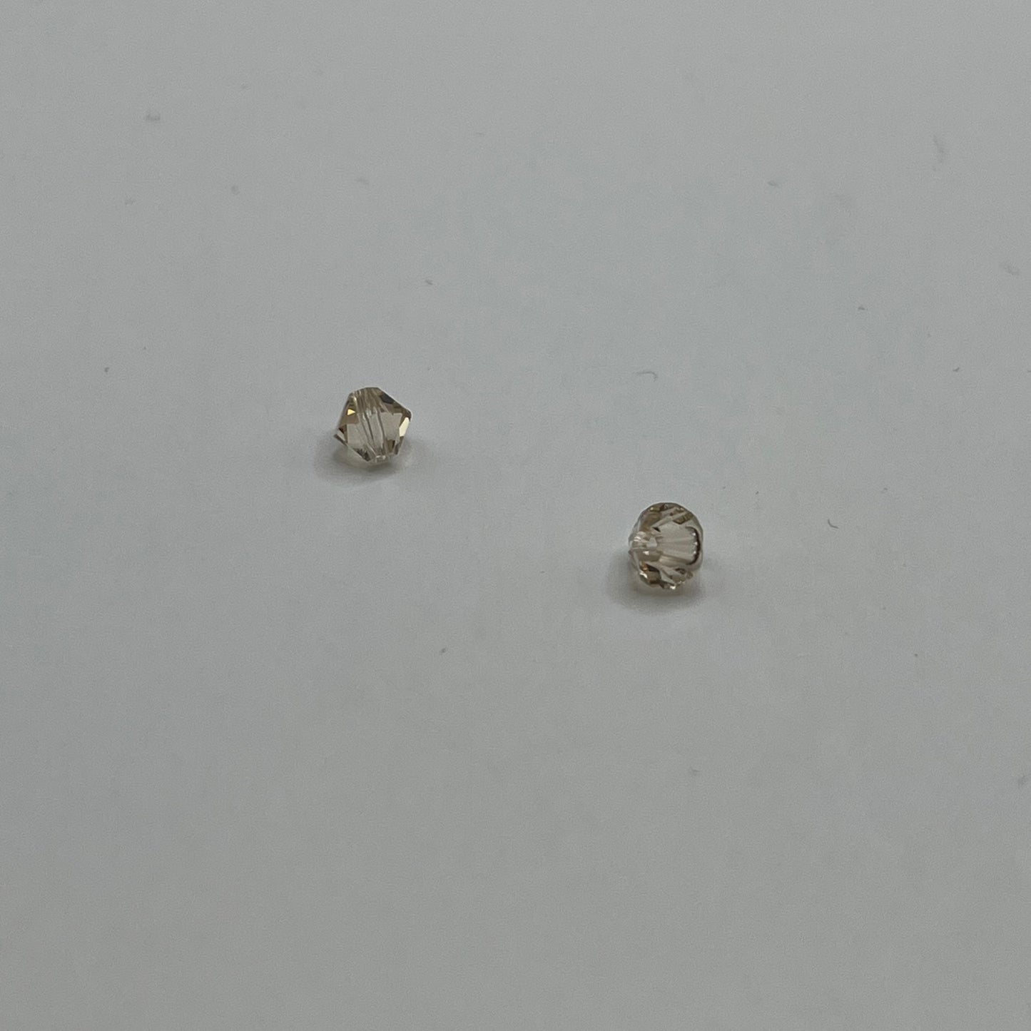 Swarovski 4MM Bicones - Ceylon Topaz (12pcs)