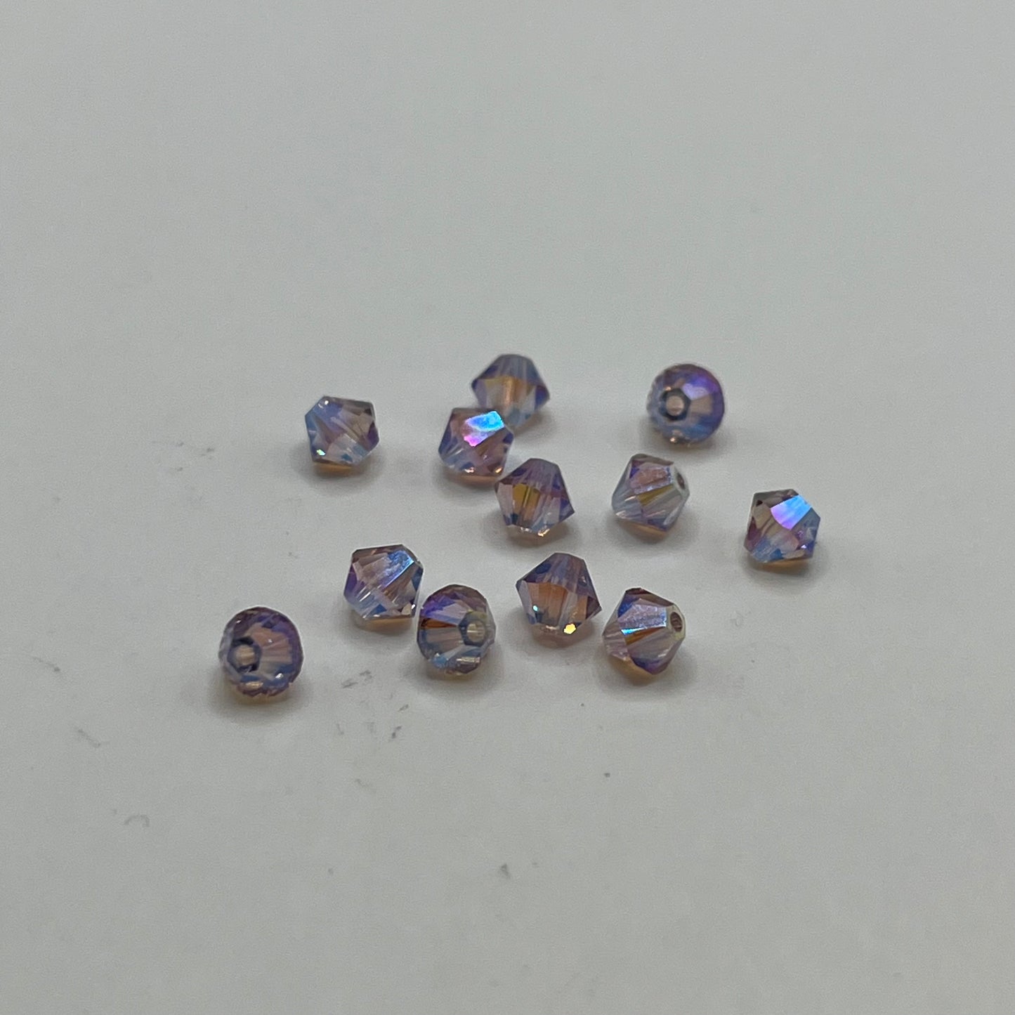 Swarovski 4MM Bicones - Light Amethyst AB2X (12pcs)