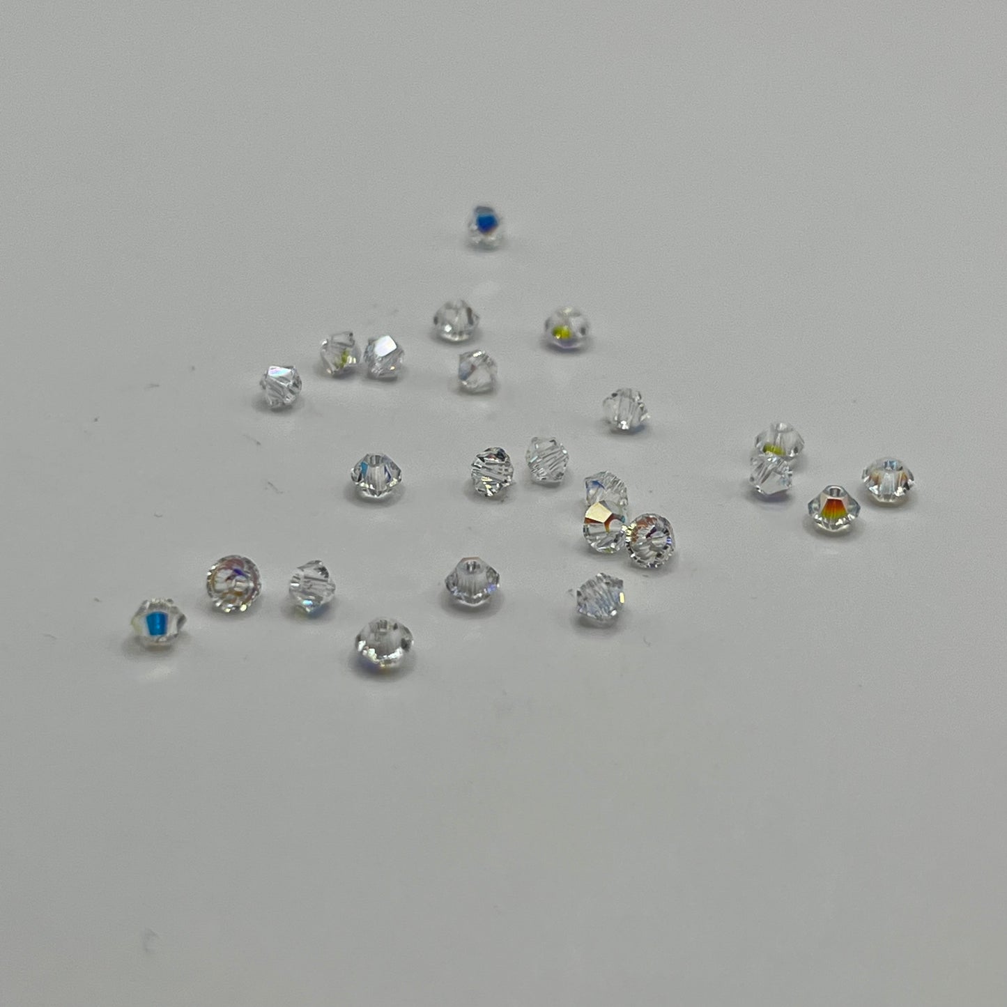 Swarovski 3MM Bicones - Crystal AB (24pcs)