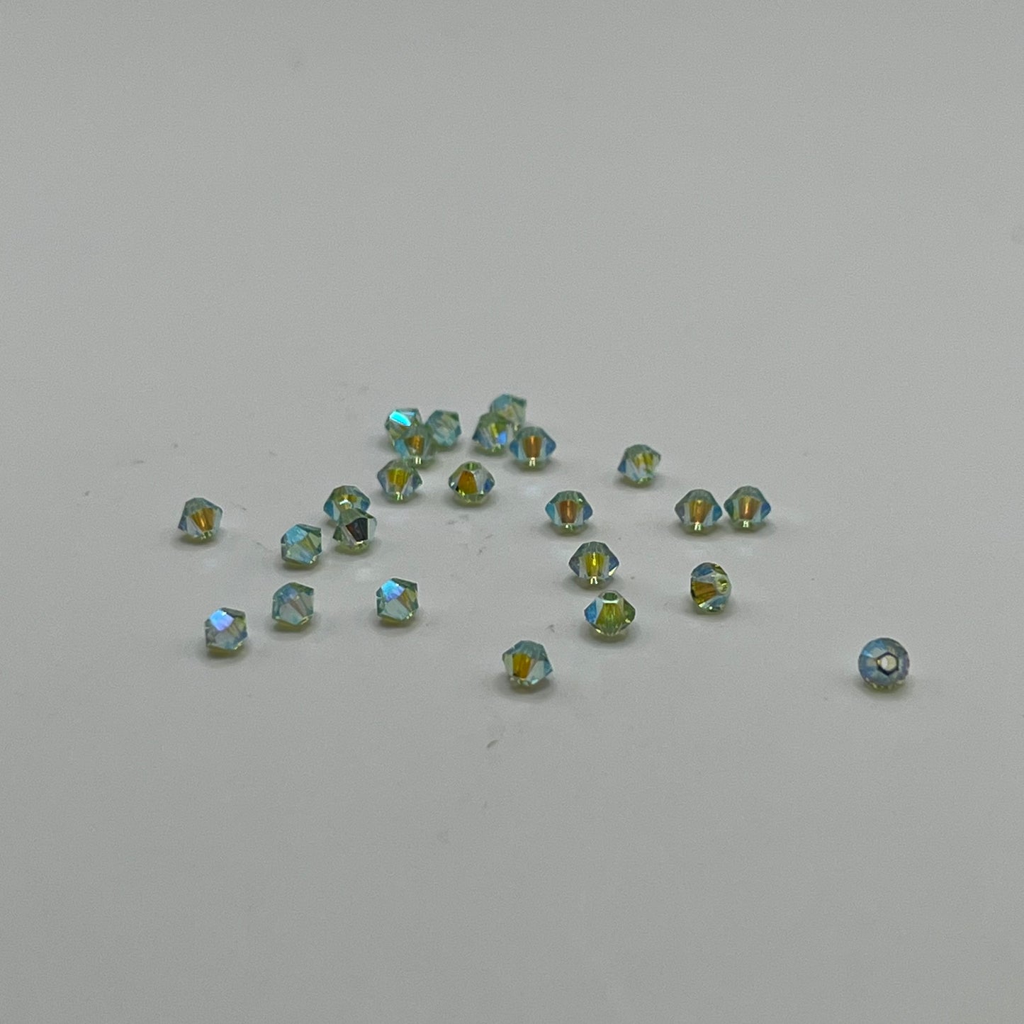 Swarovski 3MM Bicones - Peridot AB2X (24pcs)