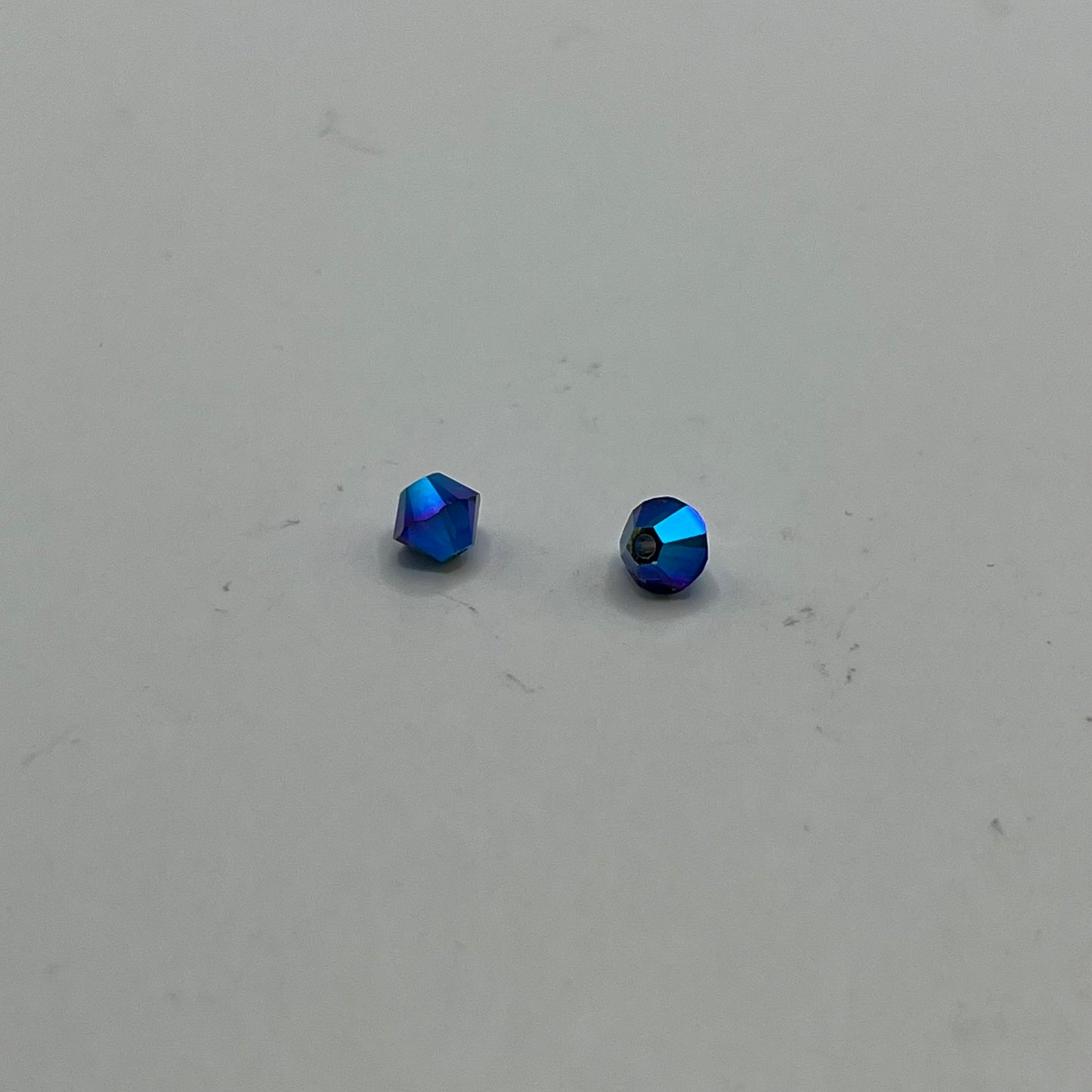 Swarovski 4MM Bicones - Dark Sapphire AB2X (12pcs)