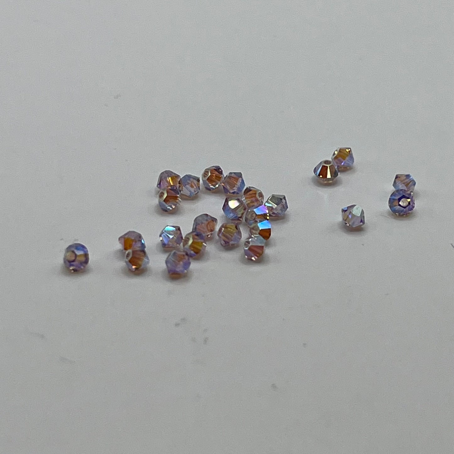 Swarovski 3MM Bicones - Light Amethyst AB2X (24pcs)