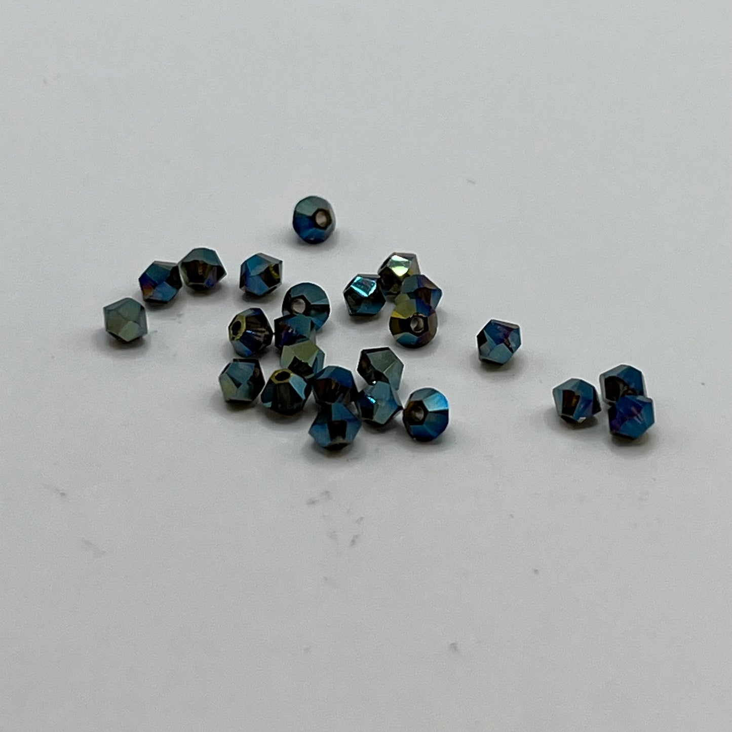 Swarovski 3MM Bicones - Crystal Iridescent Green AB2X (24pcs)