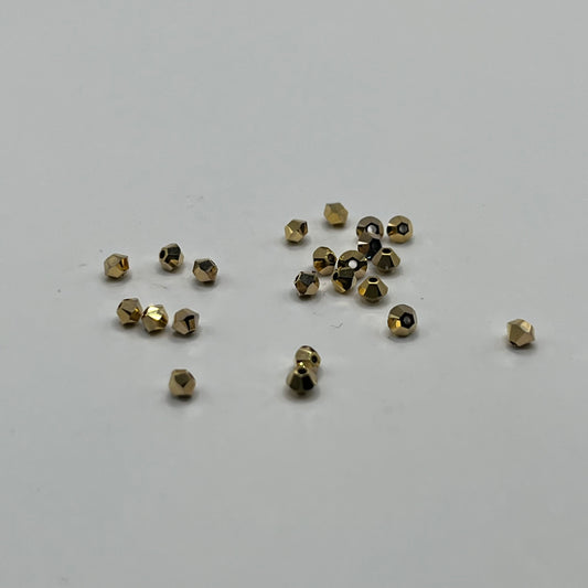 Swarovski 3MM Bicones - Crystal Aurum 2X (24pcs)