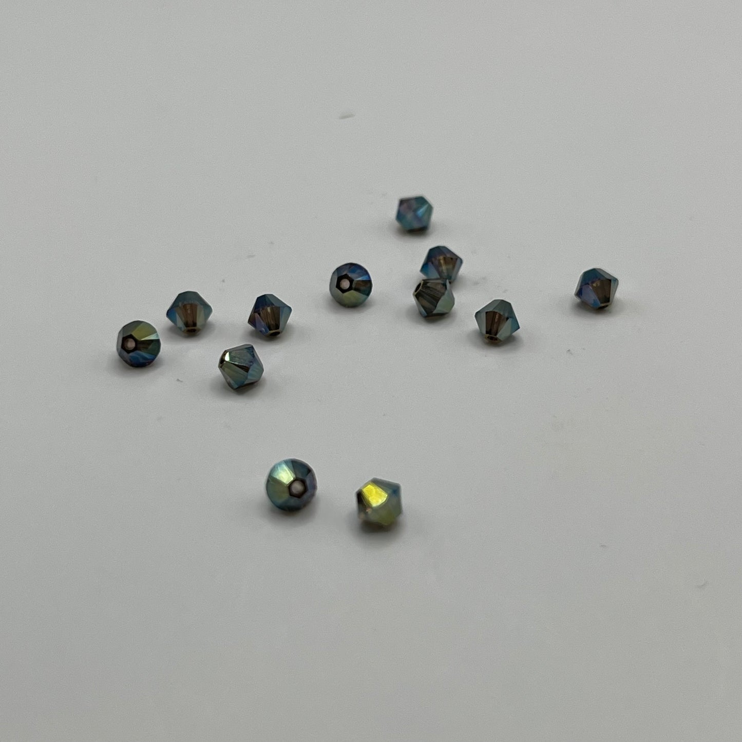 Swarovski 4MM Bicone - Crystal Iridescent Green AB2X (12pcs)