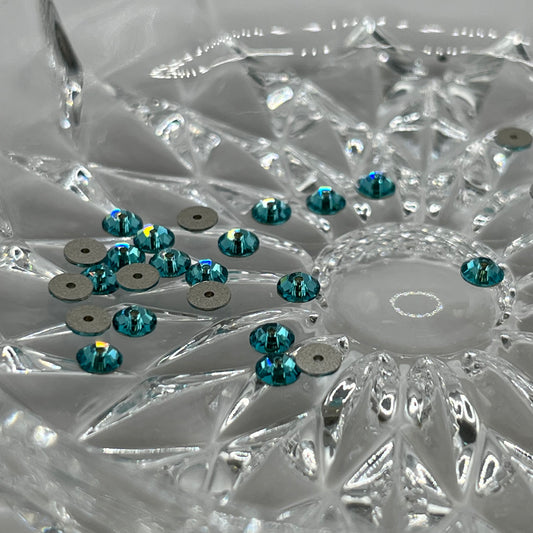Swarovski 4MM Lochrosen A3128 - Light Turquoise (24pcs)