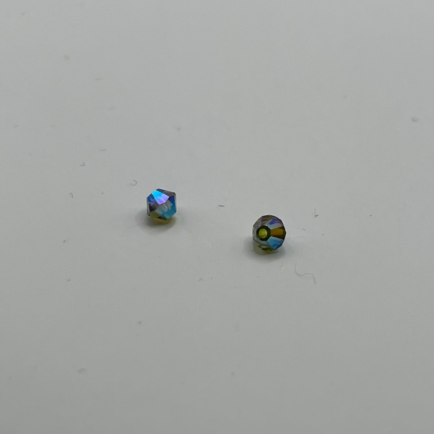Swarovski 4MM Bicones - Olivine AB2X (12pcs)