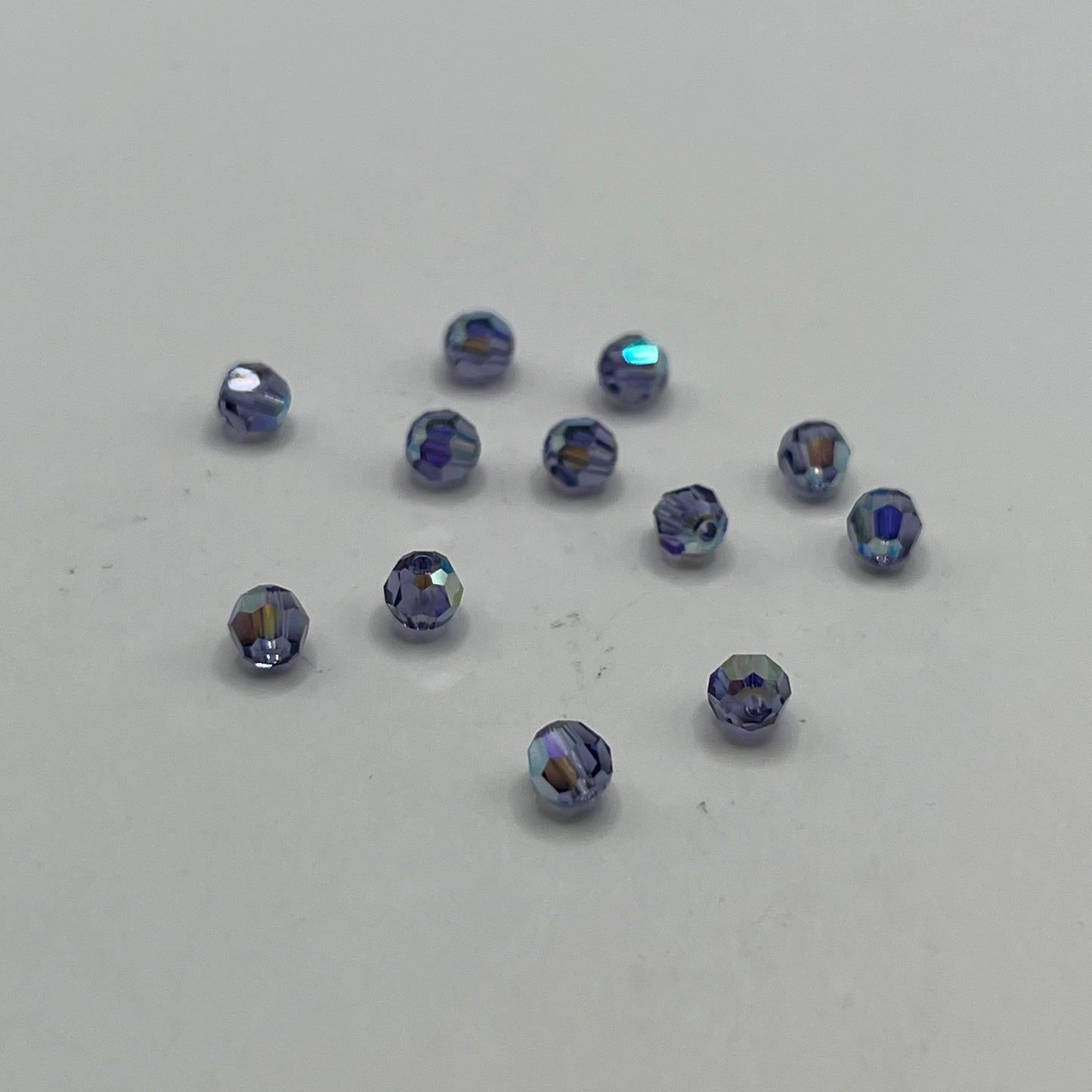 Swarovski 4MM Round Faceted A5000 - Tanzanite AB (12pcs)