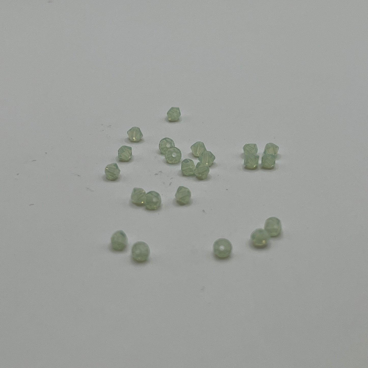 Swarovski 3MM Bicones - Chrysolite Opal (24pcs)