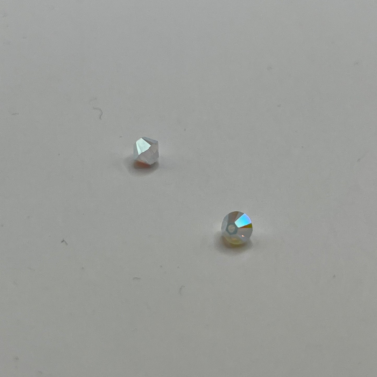 Swarovski 4MM Bicones - White Opal AB2X (12pcs)